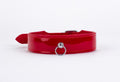 Pelle verniciata con supporto in pelle di agnello rossa